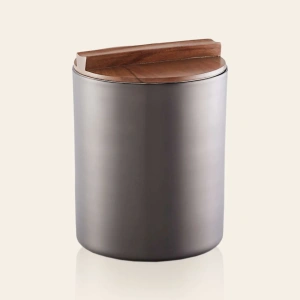 this is an image by the empty space that deals in premium home décor items online in India. The is an image of barware product of the empty spaces. The product is stainless steel ice bucket which is made in India.